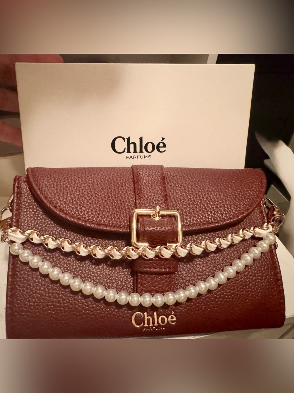 Chloé Parfums Burgundy Small clutch with Gold Buckle and pearl chain
